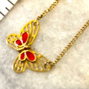 Girl’s necklace. Gold and red enamel butterfly